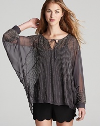 Add ethereal style to your closet with this sheer, bead-embellished Parker top. Pair with scalloped shorts and heels for a chic night out or dress up denim for weekend brunch.