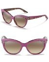 Retro-inspired cat eye sunglasses with fanned out frames and leopard printed trim.