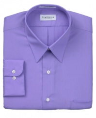 Brighten your palette for the warmer weather. This Van Heusen dress shirt is a great complement to charcoal gray or black.