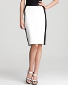 The pencil silhouette gets a modern update with this 10 Crosby Derek Lam skirt. The black and white color-blocking is an unexpected touch that is sure to give your go-to work wardrobe a little boost.