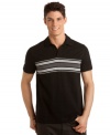 Get easy on-the-go style by making this comfortable Calvin Klein Jeans polo shirt a staple in your everyday wear.