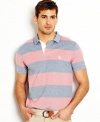 Add some prep to your summer style with this oxford striped polo shirt from Nautica.