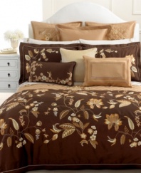 Beautifully embroidered leaves in stunning silver decorate the hem of this Martha Stewart Collection pillowcase for a dramatic effect. (Clearance)