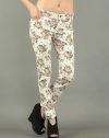 White floral skinny jeans