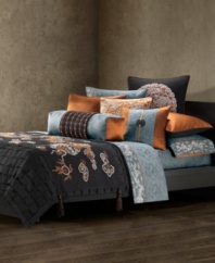 Natori's bolster pillow complements the Bushido bedding collection, featuring a grey-on-grey jacquard woven dragon design. Embellished with a copper and black Obi wrap detail.