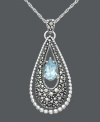 The perfect frame. Genevieve & Grace's elegant teardrop pendant features a blue topaz (1-1/4 ct. t.w.) framed with glittering marcasite. Crafted in sterling silver. Approximate length: 18 inches. Approximate drop: 1-5/8 inches.