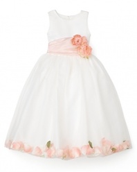 The Petal dress from US Angels is perfect for a party or a formal affair, with its flowing skirt and wide ribbon sash with flower detail at waist.