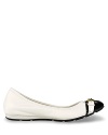 Buckled down elegance in a ballet flat with cap toe detail. From Cole Haan.