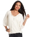 The peasant style is made modern with this shadow-striped GUESS top -- perfectly paired with denim!