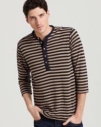 An inspired look from Diesel features a three-quarter sleeve, stripes, an interior pattern of cross hatches and a henley placket for maximum coolness and unique appeal.