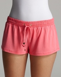 Super soft shorts with a drawstring waist and signature heart charm accent.