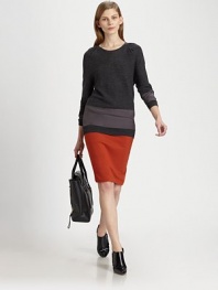Lengthy, featherweight sweater of merino wool has pleated shoulders and glistening silk panels. RoundneckPleated shouldersLong sleeves with silk panelsSilk panel at hipsLonger length hits below the hipsBody: Merino wool; Contrast: SilkDry cleanImportedModel shown is 5'10 (177cm) wearing US size Small.