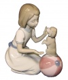 Nao by Lladro Collectible Porcelain Figurine: LEARNING NEW TRICKS - 7 3/4 tall - a girl training her puppy dog.....very cute!