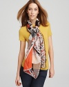 A sheer oblong scarf with smoldering hues in an abstract print.