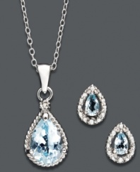Rhapsody in blue. A lovely light blue hue defines the topaz stones (5-1/2 ct. t.w.) of this stylish earrings and pendant necklace set from Victoria Townsend. Crafted in sterling silver, they're sure to enhance any ensemble for day or evening. Approximate length (necklace): 18 inches. Approximate drop (pendant): 3/4 inch. Approximate diameter (earrings): 1/3 inch.