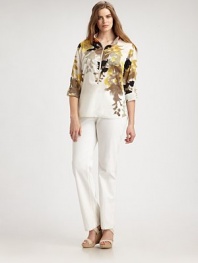 If you're looking for a blouse with an intriguing print, perfect fit and timeless grosgrain, look no further. This is a design that offers an effortlessly chic look season after season.Grosgrain collarButton and snap details on sleevesZipper frontBack yokeAbout 25 from shoulder to hemCottonDry cleanImported