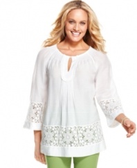 A crisp cotton tunic is emboldened with lace insets at the sleeves and hem, from Charter Club. Pair it with vibrant pants for the chicest look of the season!